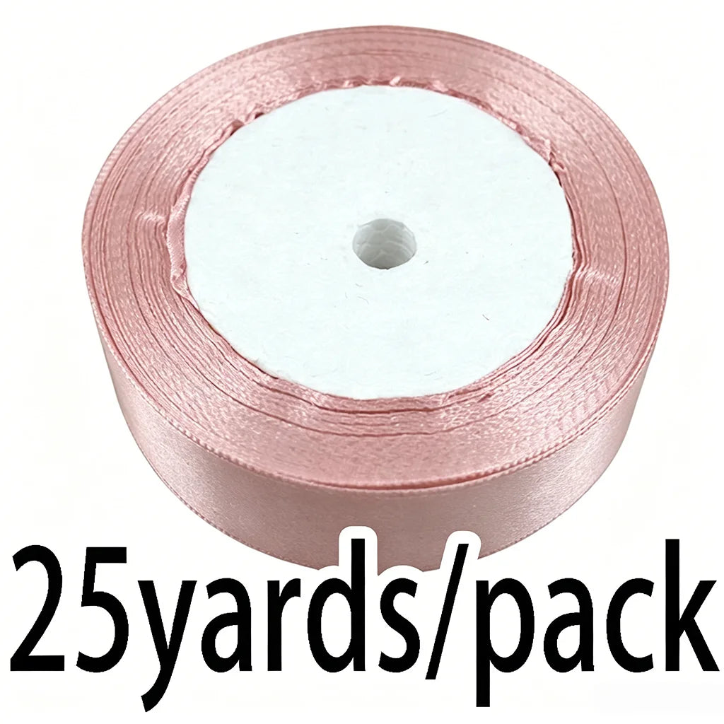 A roll of light pink satin gift ribbon, 25 yards per pack.