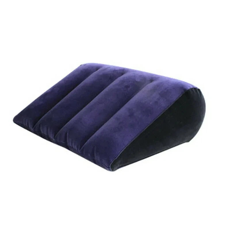 A dark purple inflatable body support pillow used for travel, bed, or yoga.