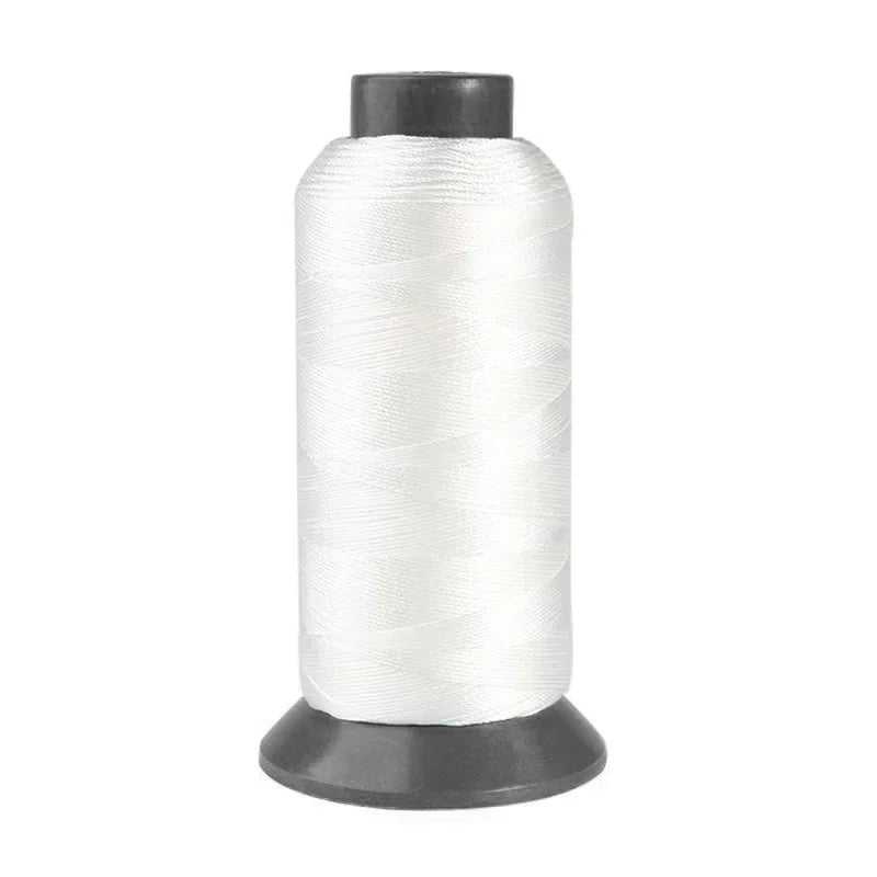 Roll of heavy duty 3-ply nylon sewing thread on a spool.