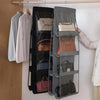 A double-sided hanging closet organizer bag with multiple mesh pockets for storing accessories.
