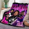 A graphic print featuring a purple and black stylized text design on a fleece throw blanket.