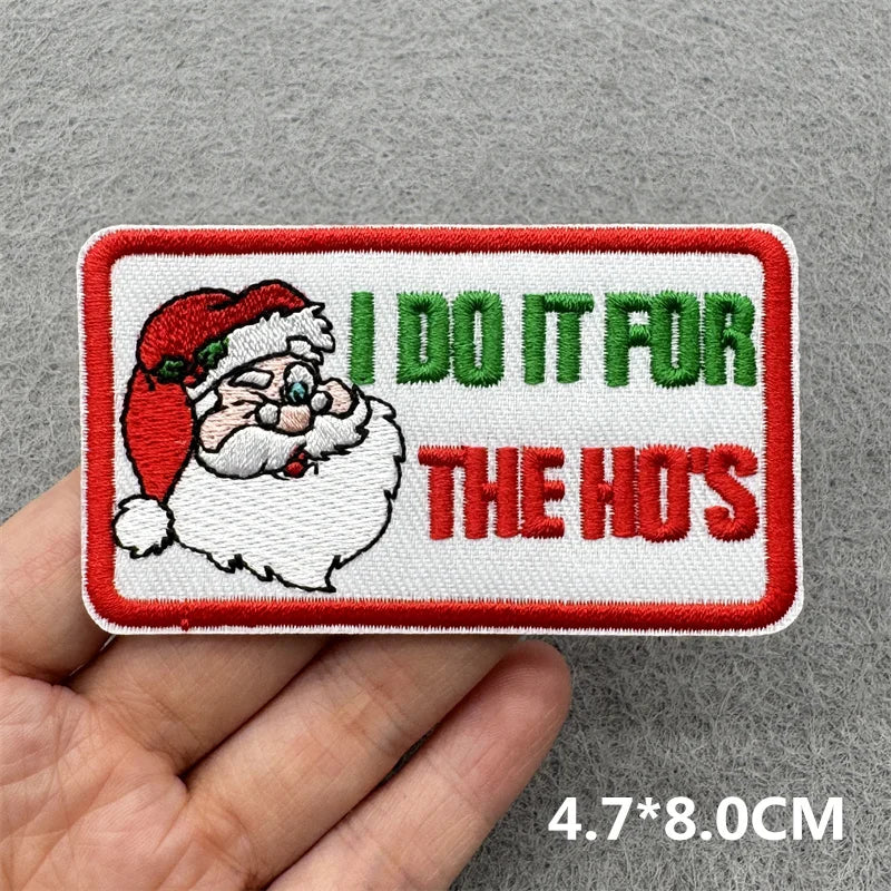 Red and white embroidered patch featuring a Santa face with a beard and the text I DO IT FOR THE HOS