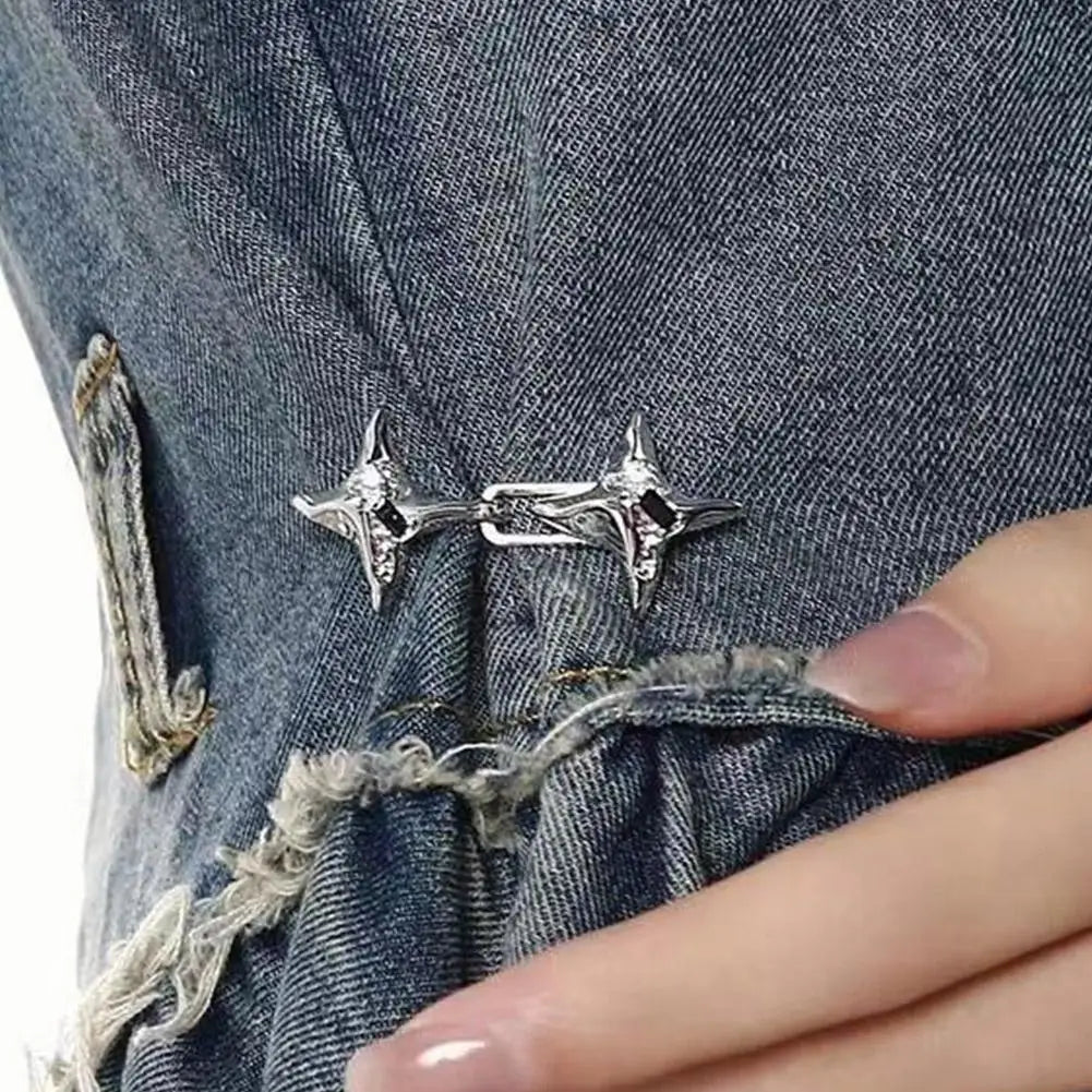 Silver adjustable waist tightening buckle for jeans shown on denim fabric