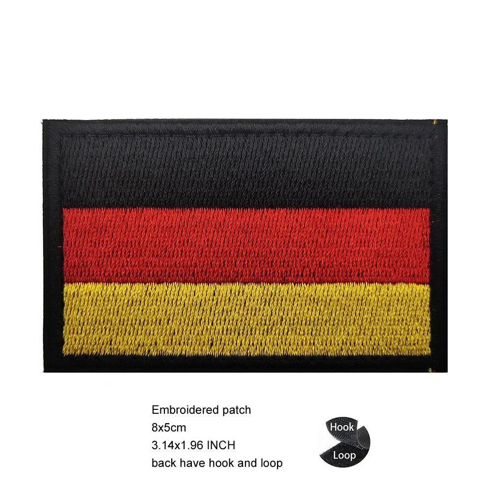 Black embroidered patch featuring the German flag design in red, yellow, and black stripes