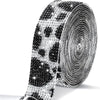 Roll of clear rhinestone sticker ribbon with black leopard print pattern