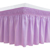A lavender ruffle bed skirt with an adjustable elastic belt.