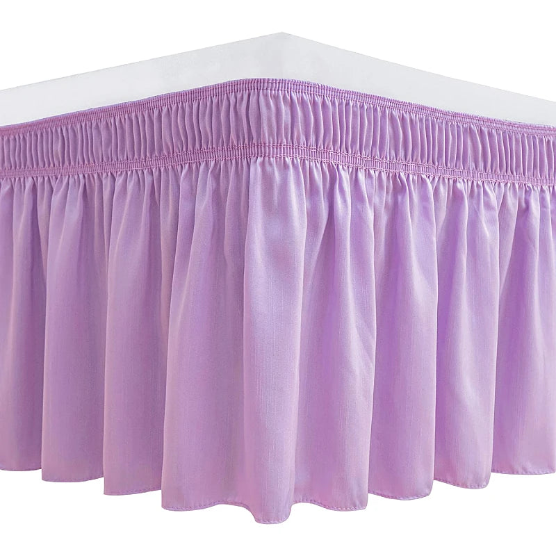 A lavender ruffle bed skirt with an adjustable elastic belt.