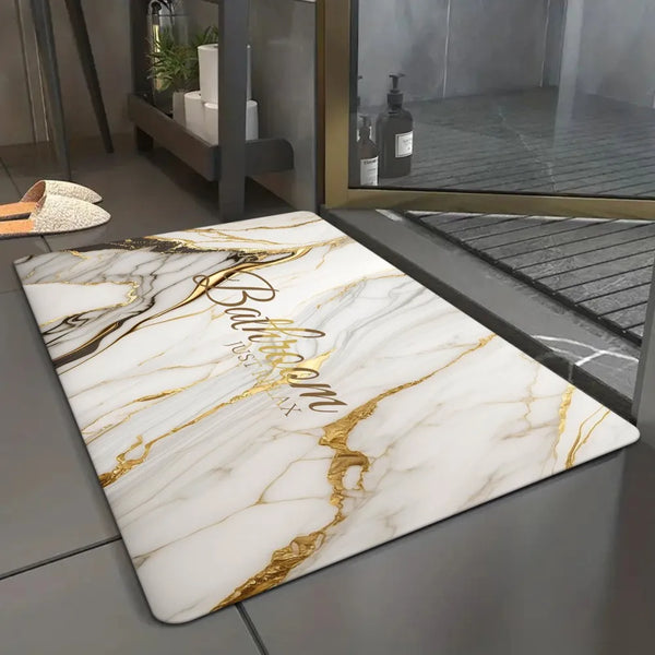 A rectangular marble door mat with white and gold veining placed in front of a glass cabinet.