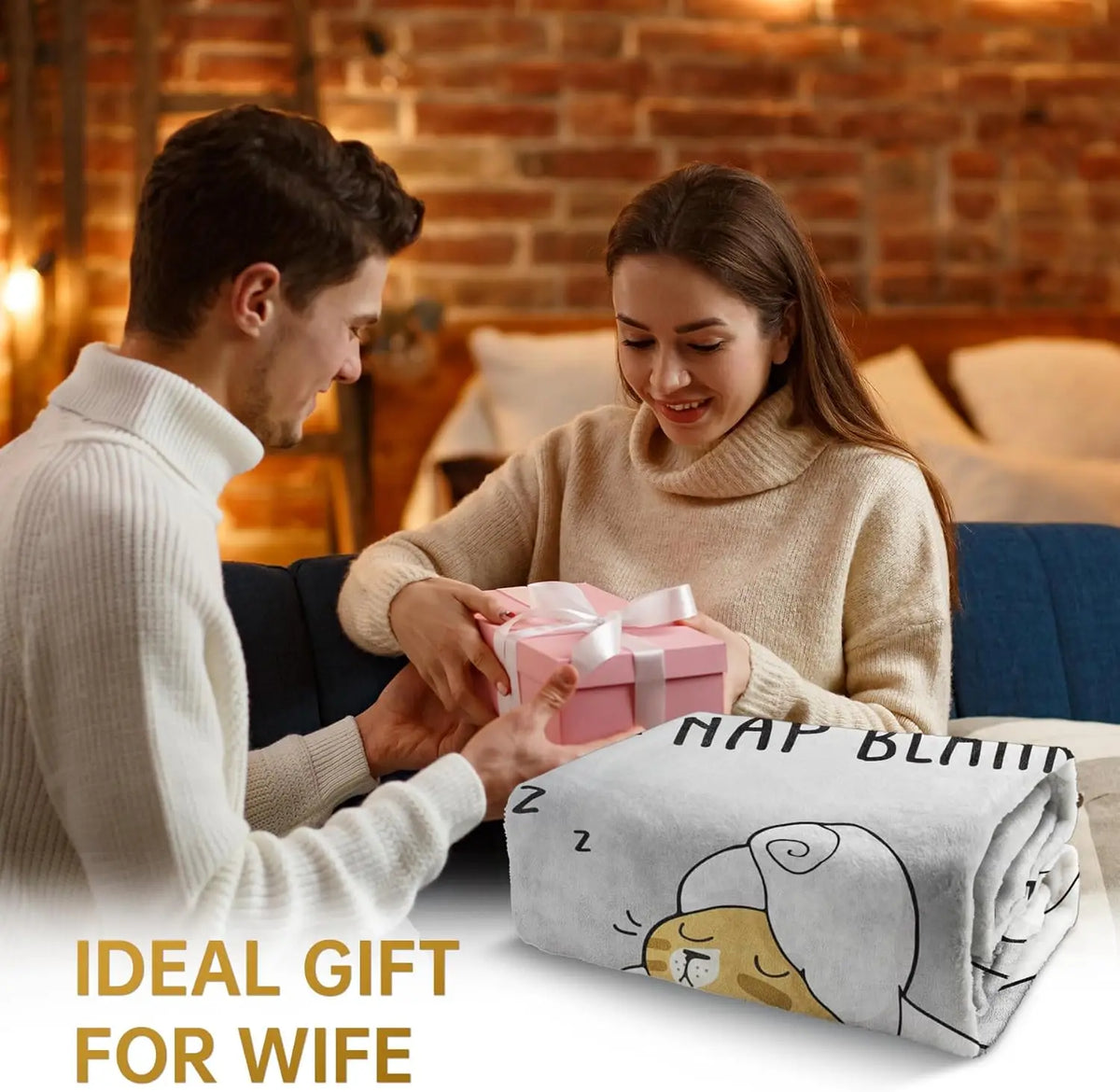 A woman is wrapping a pink gift box for a man in a cozy, knitted sweater indoors.