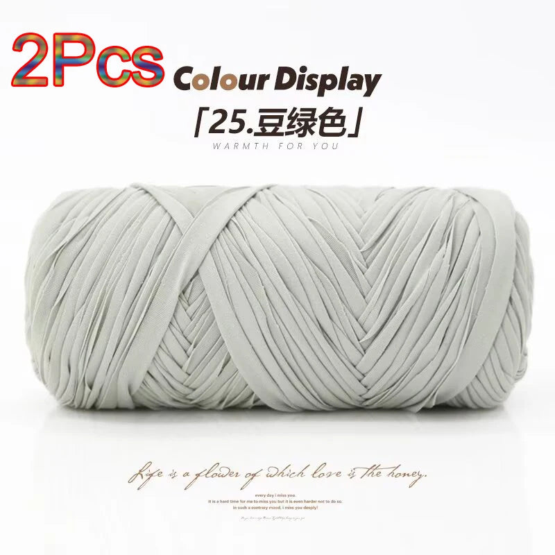 A ball of light gray reusable elastic yarn used for crafting.