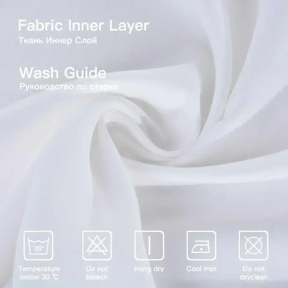 White fabric inner layer with washing instructions displayed on a white background