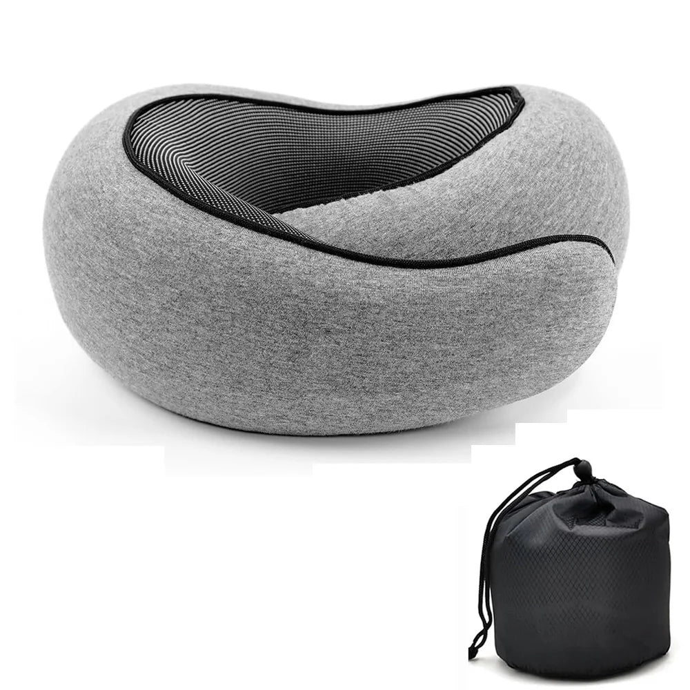 Gray memory foam travel neck pillow with a black mesh cover