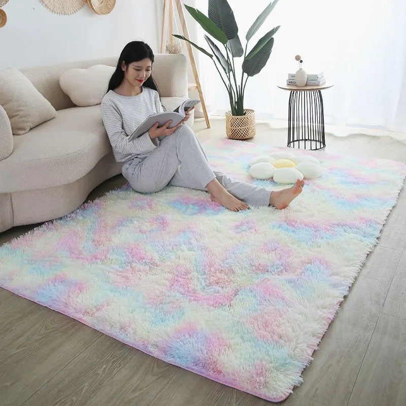 A woman sits on a light sofa reading a book on a fluffy pink and blue Modern Nordic Style Decor rug.