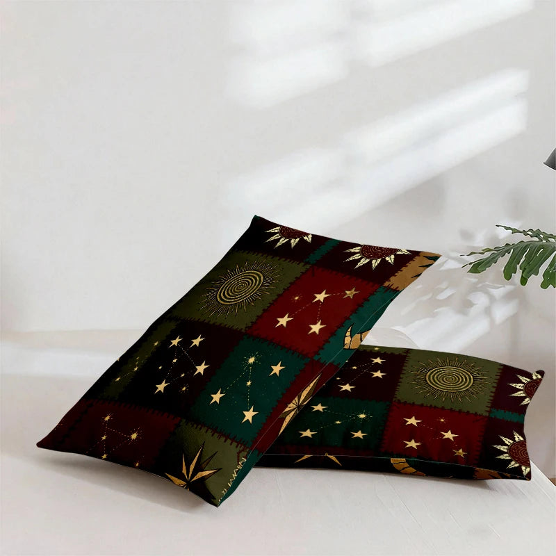 A dark green and burgundy patchwork bedding set featuring gold sun and moon patterns.