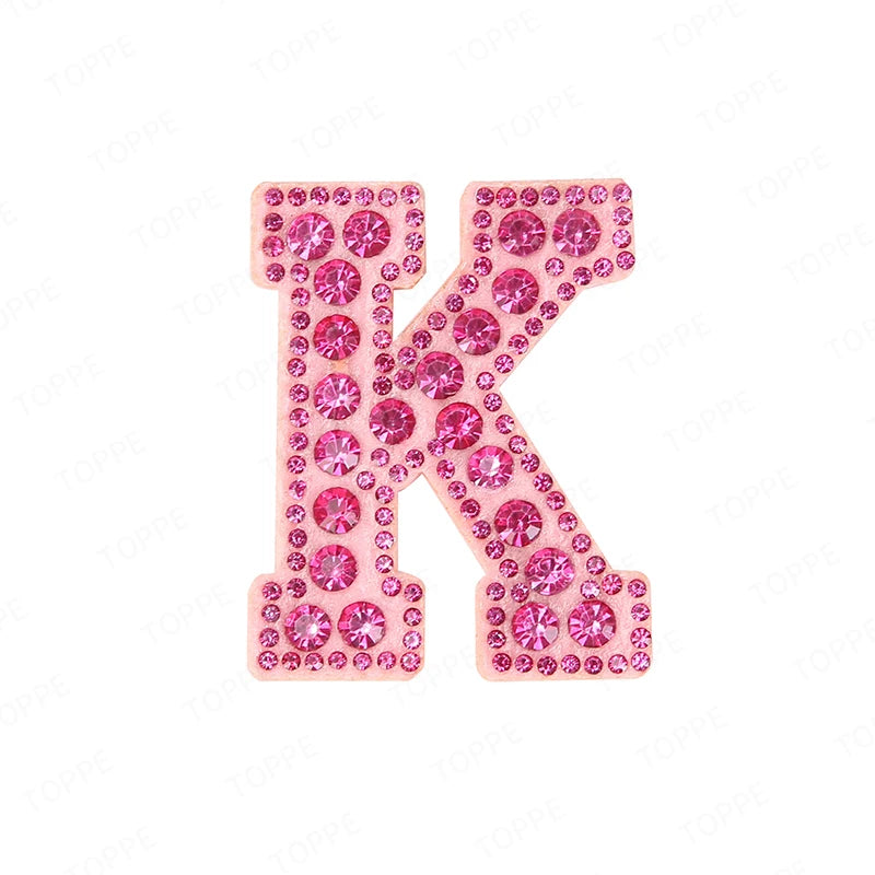 Pink rhinestone letter K patch for DIY craft project