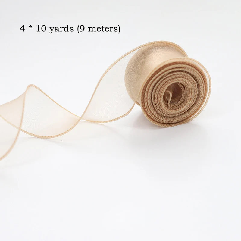 Roll of sheer beige organza ribbon measuring 10 yards or 9 meters for crafting and wrapping