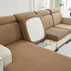 A beige jacquard elastic sofa cushion slipcover shown in a living room setting.