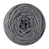 A ball of gray soft t-shirt yarn used for crochet