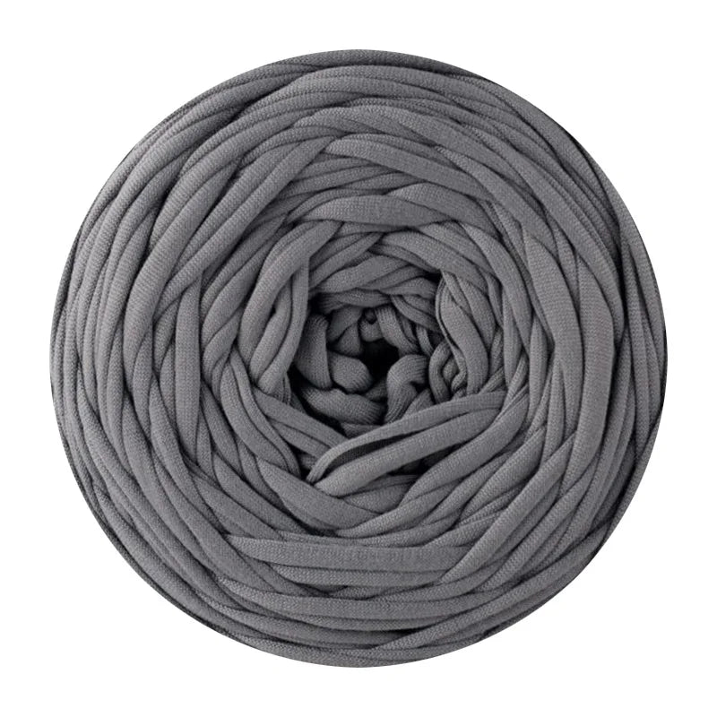 A ball of gray soft t-shirt yarn used for crochet