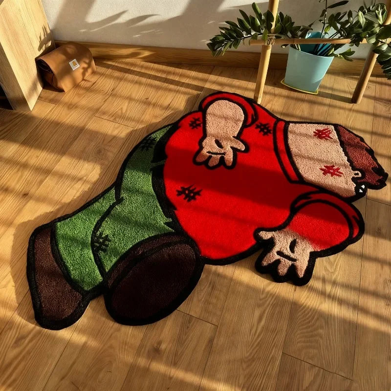 A red cartoon rug shaped like a person lying down on a wooden floor.