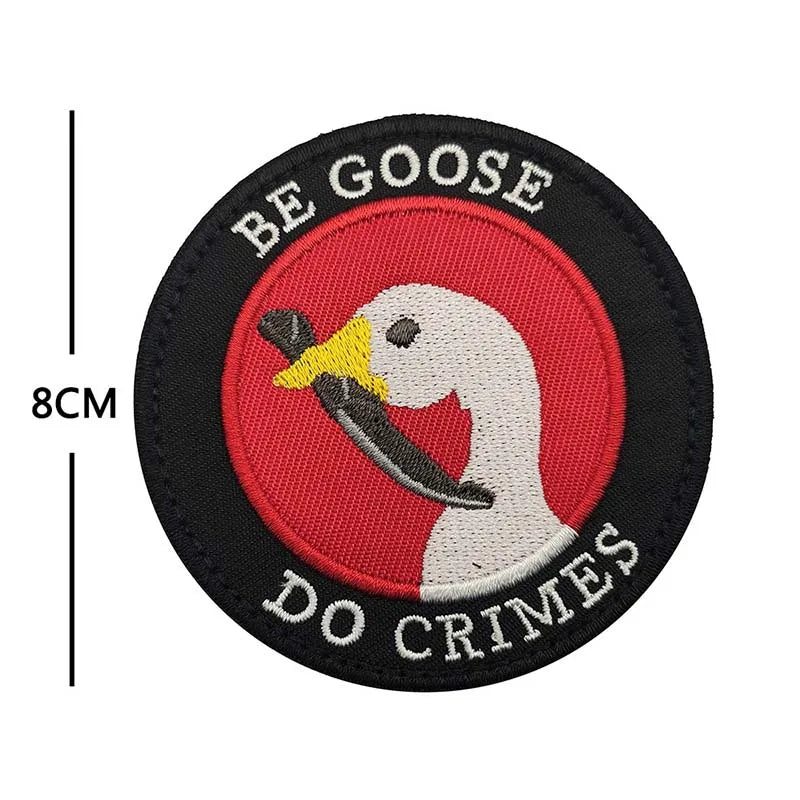 Black embroidery patch featuring a white goose head silhouette on a red background with the text BE GOOSE DO CRIMES