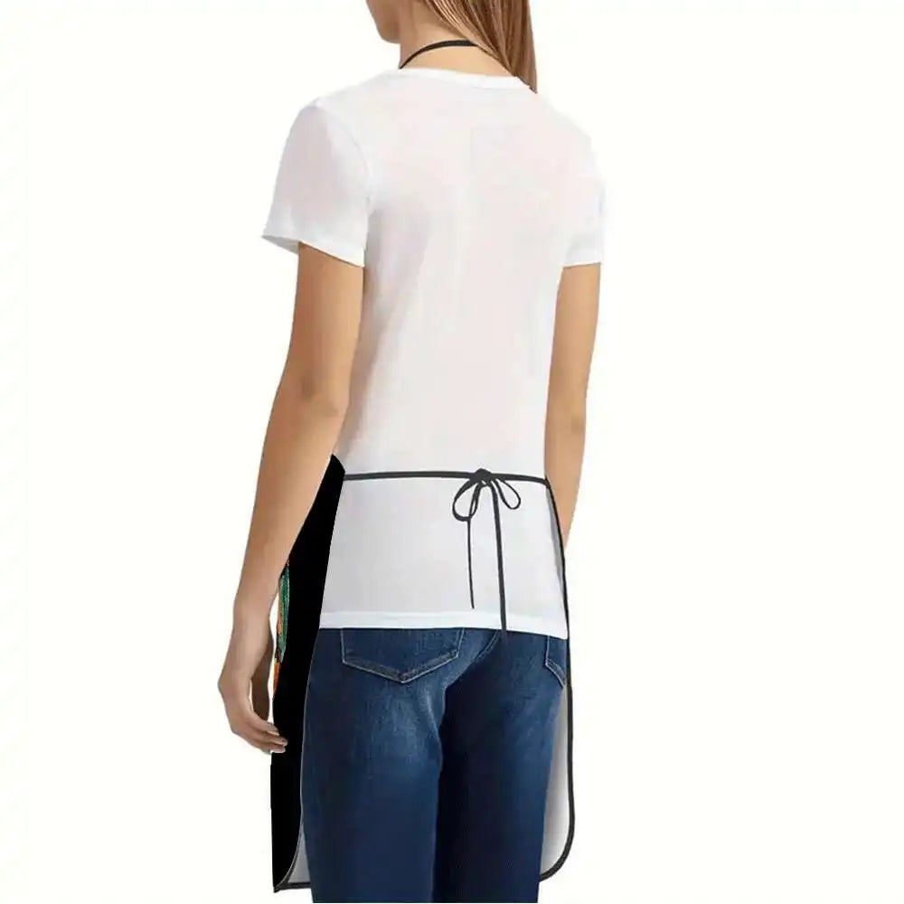 White t-shirt and dark blue jeans paired with a black floral print apron.