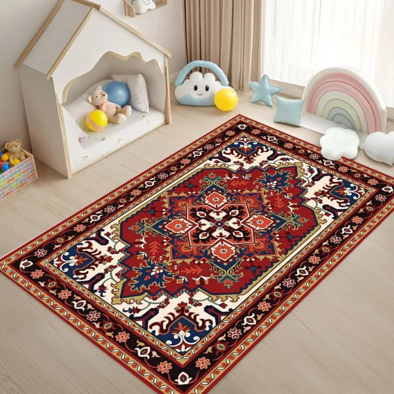 A richly patterned bohemian Persian area rug featuring deep reds, blues, and cream accents on a light wood floor.