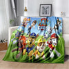 A green flannel throw blanket featuring characters from the PAW Patrol cartoon.
