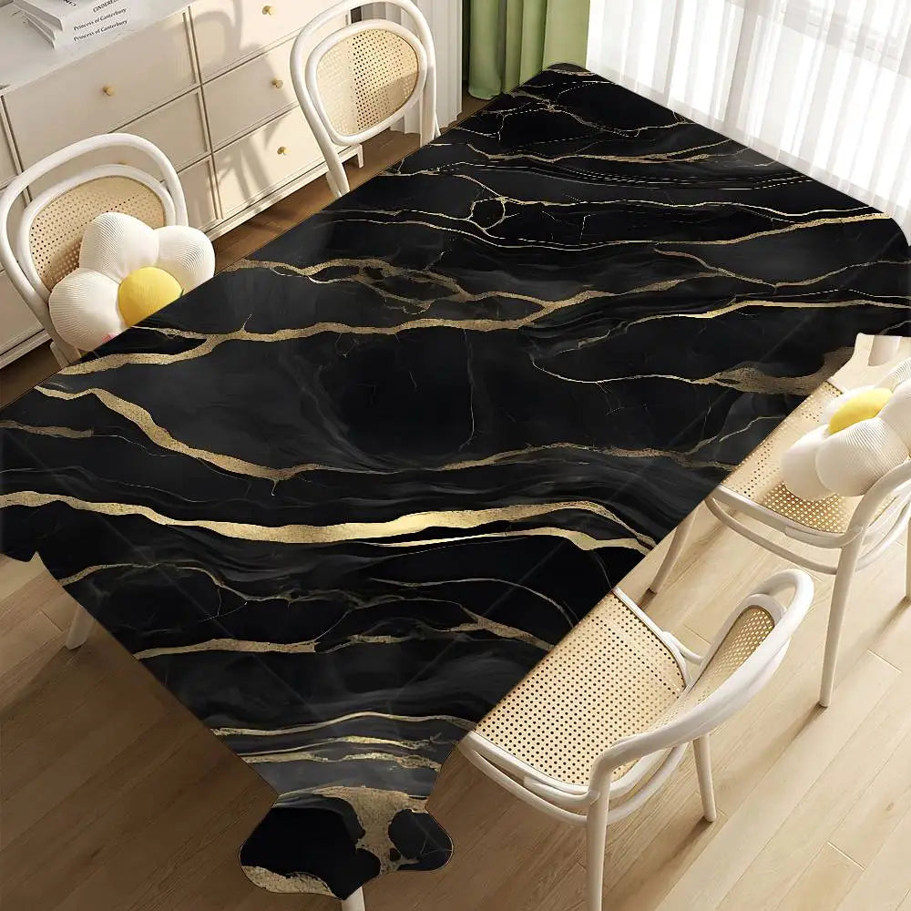 Black marble patterned fabric draped over a light wood floor with white chairs.