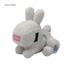 A soft, white stuffed dragon plush toy with pink accents.