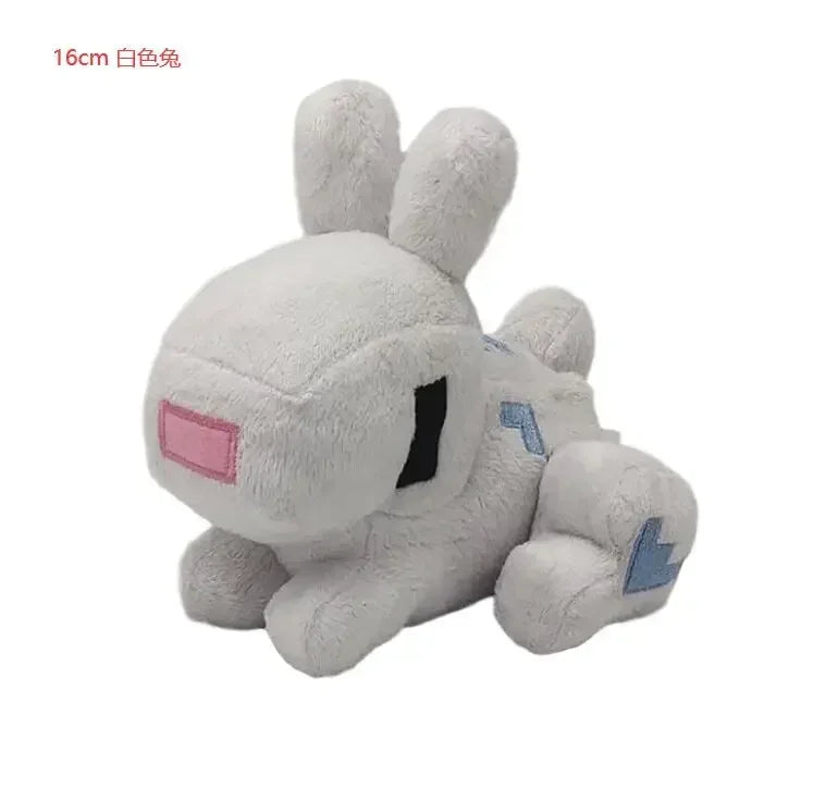 A soft, white stuffed dragon plush toy with pink accents.