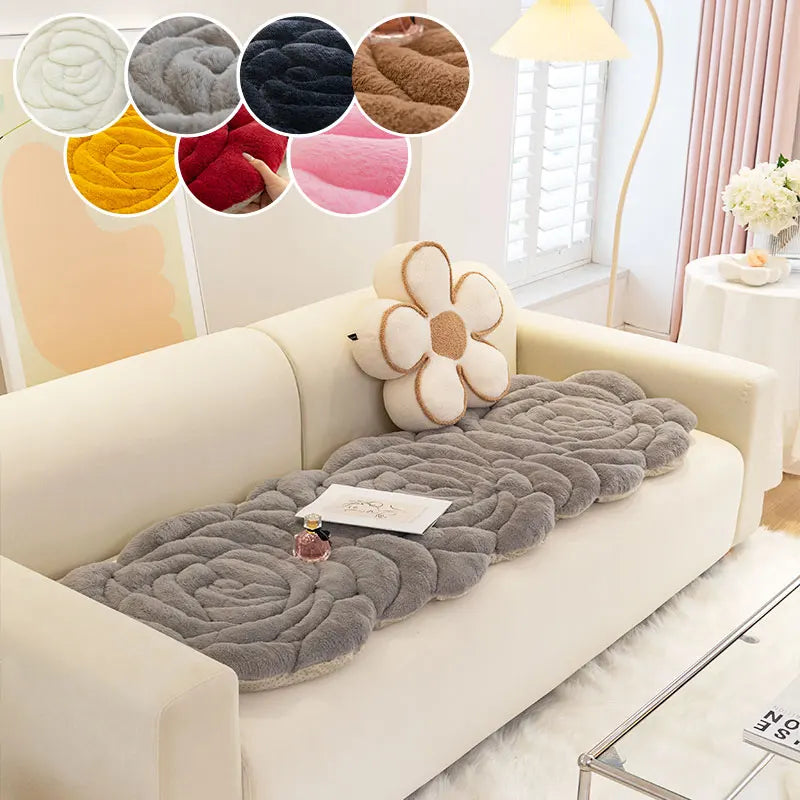 A beige sofa features a gray quilted mat and decorative floral cushions, surrounded by color swatches.
