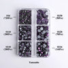 A clear plastic tray holds various sizes of purple and silver Tanzanite glass rhinestones categorized by SS6, SS10, SS10, SS2