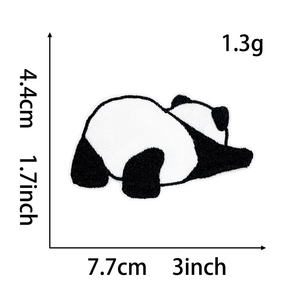 Black and white panda embroidery patch measuring 4.4 cm by 1.7 inches.