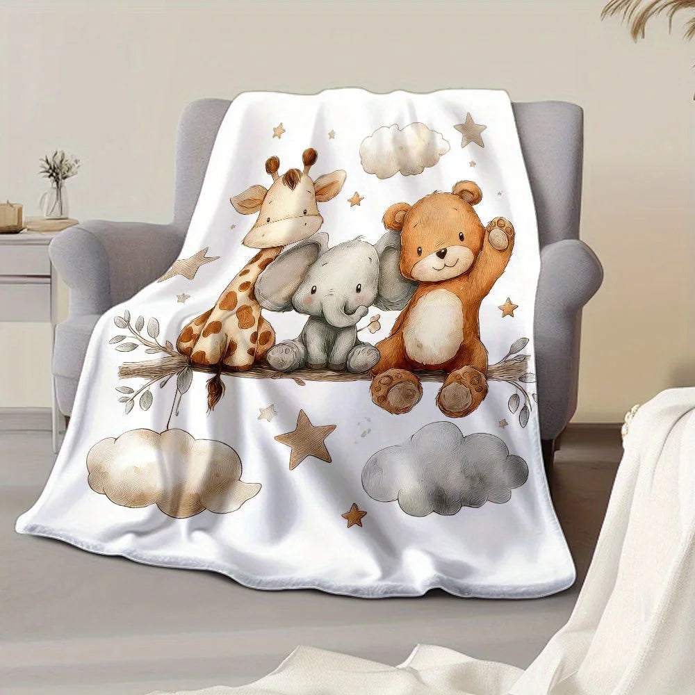 A white flannel blanket featuring cute cartoon animals like a giraffe, elephant, and bear with stars and clouds.
