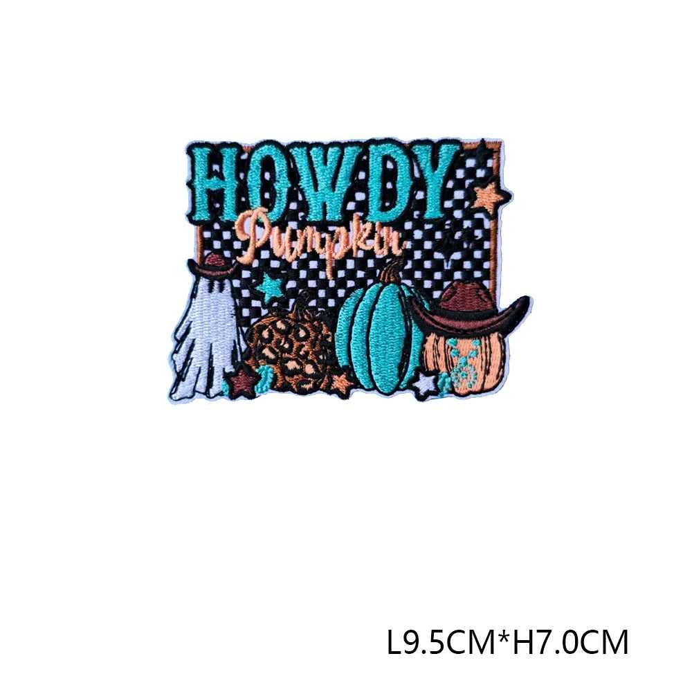 Embroidered iron-on patch featuring the text HOWDY Pumpkin with a star design and pumpkin elements.