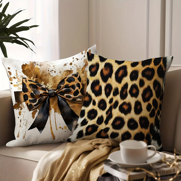 A decorative pillow cover with a leopard print design featuring brown and black spots on a white background.