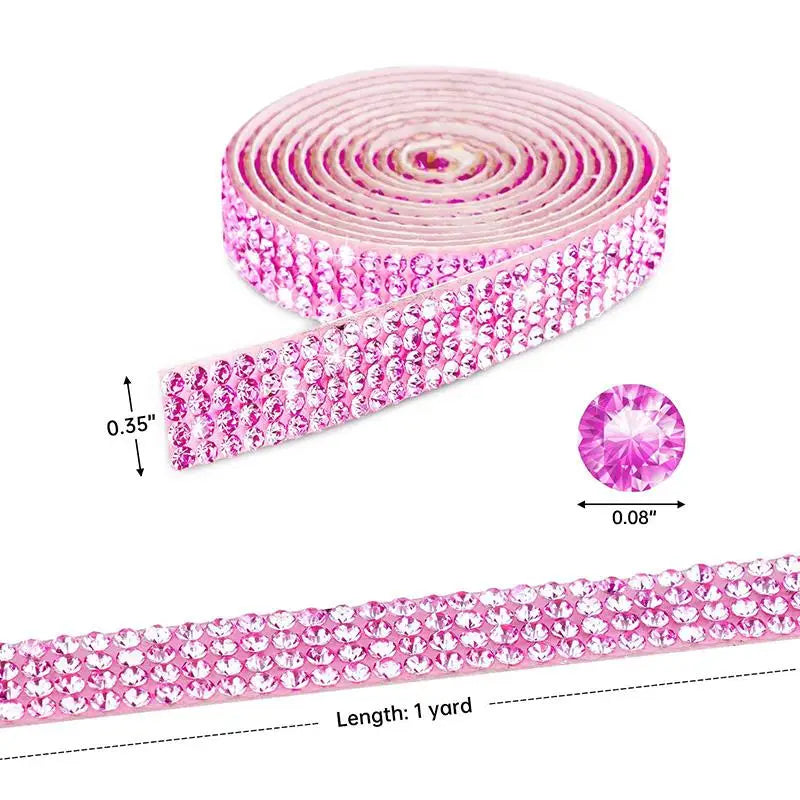 Pink crystal rhinestone sticker ribbon rolled and unrolled, showing a 1 yard length.