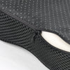 Black ergonomic U-shaped massage seat cushion with a mesh texture and a zippered opening.