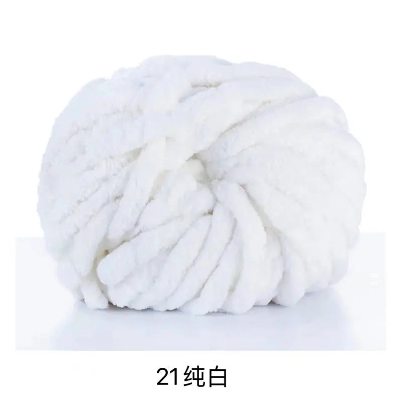 A ball of white chunky chenille yarn.