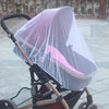 A foldable mosquito net canopy for an infant cot is shown on a stroller.