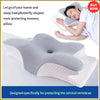 A woman is using a butterfly-shaped memory foam pillow designed for neck protection and cervical vertebrae support.