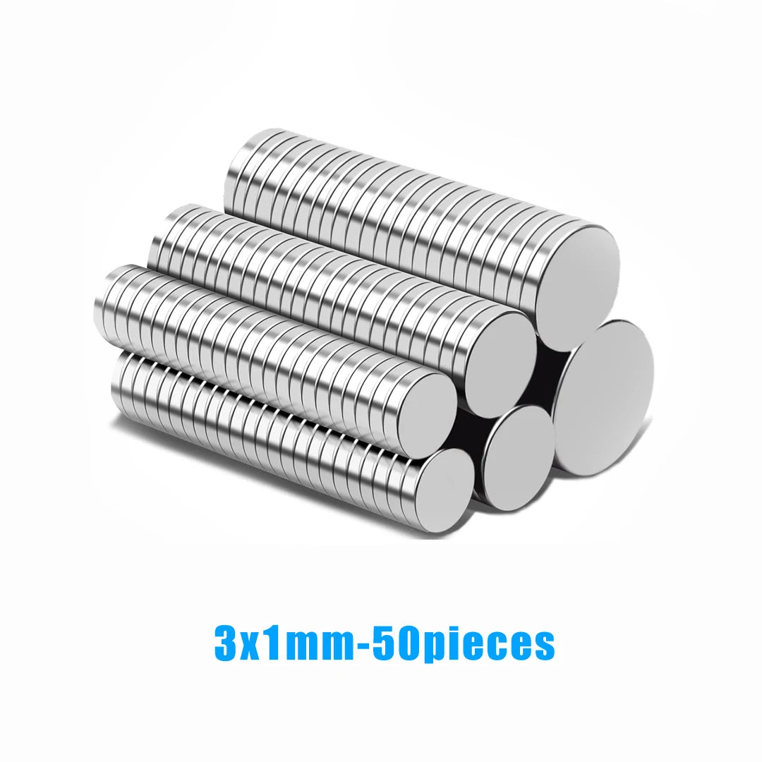 A stack of 50 silver-colored, thin magnetic strips or fridge magnets.