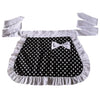 White ruffle apron with black polka dots and a bow, featuring pockets.