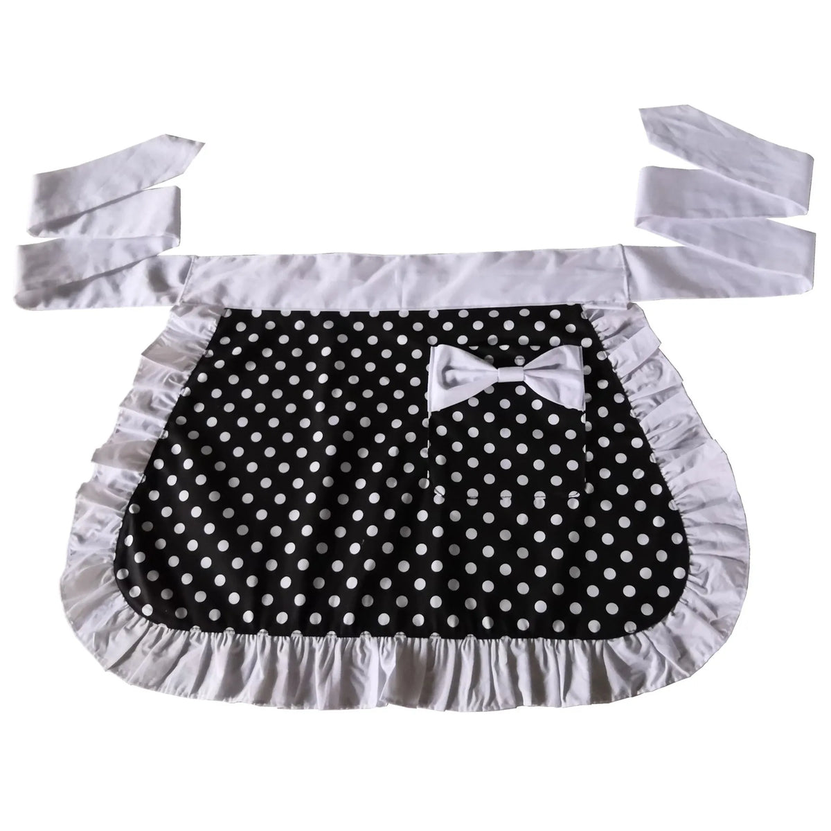 White ruffle apron with black polka dots and a bow, featuring pockets.