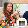 A woman is using a set of ergonomic gold crochet hooks for beginner crafting and crocheting.