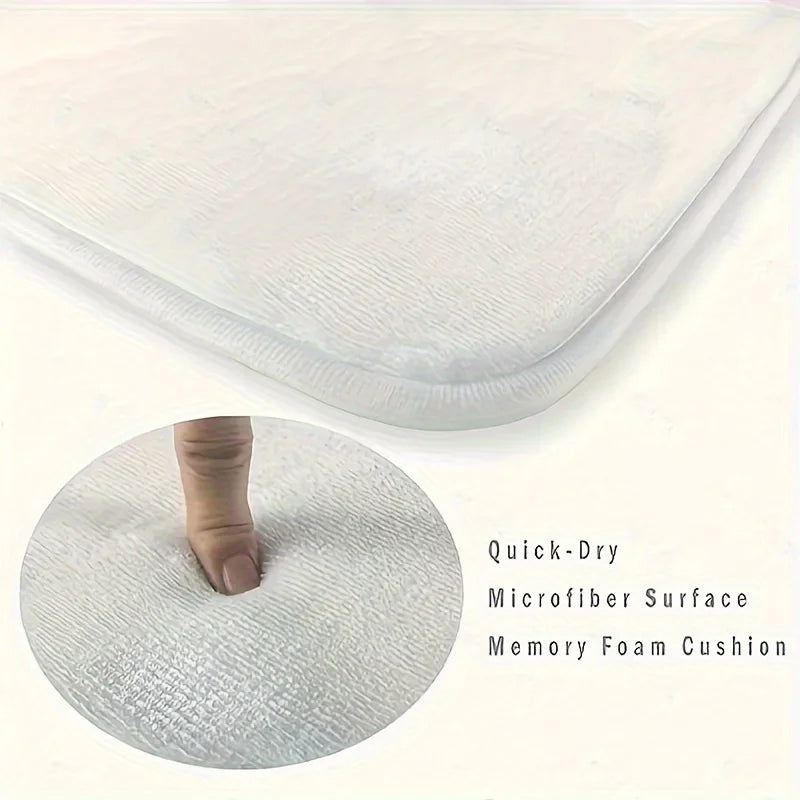 A white microfiber memory foam cushion mat is shown in a close-up view.