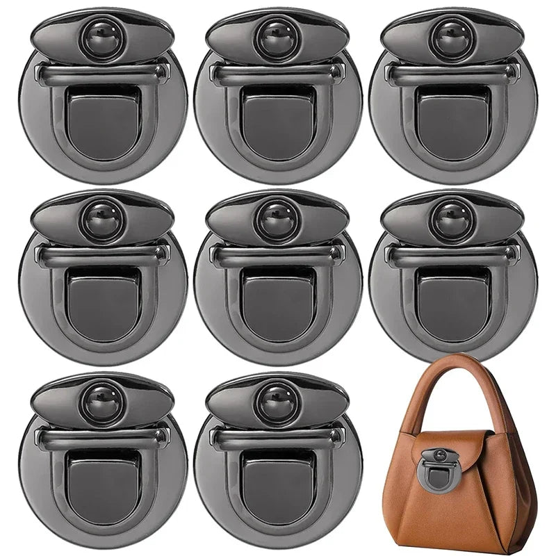 A set of gold metal twist locks for bags and cases shown in various angles.
