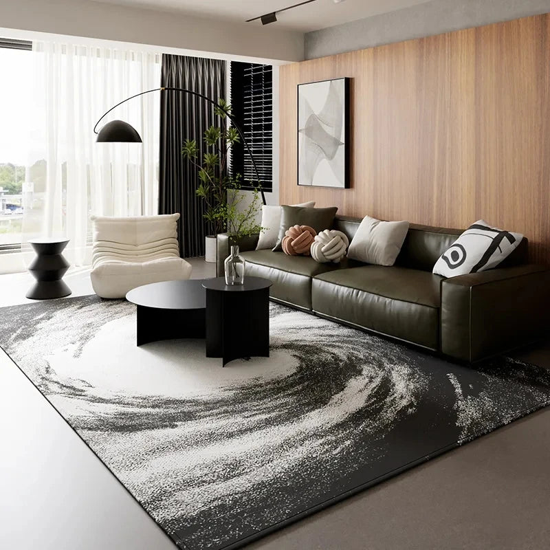 A black and white geometric non-slip area rug is displayed in a modern living room setting.