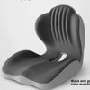 A gray ergonomic memory foam lumbar support cushion shown from the side.